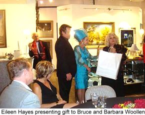 Eileen Hayes presented a special gift to host and hostess Bruce and Barbara Woollen.